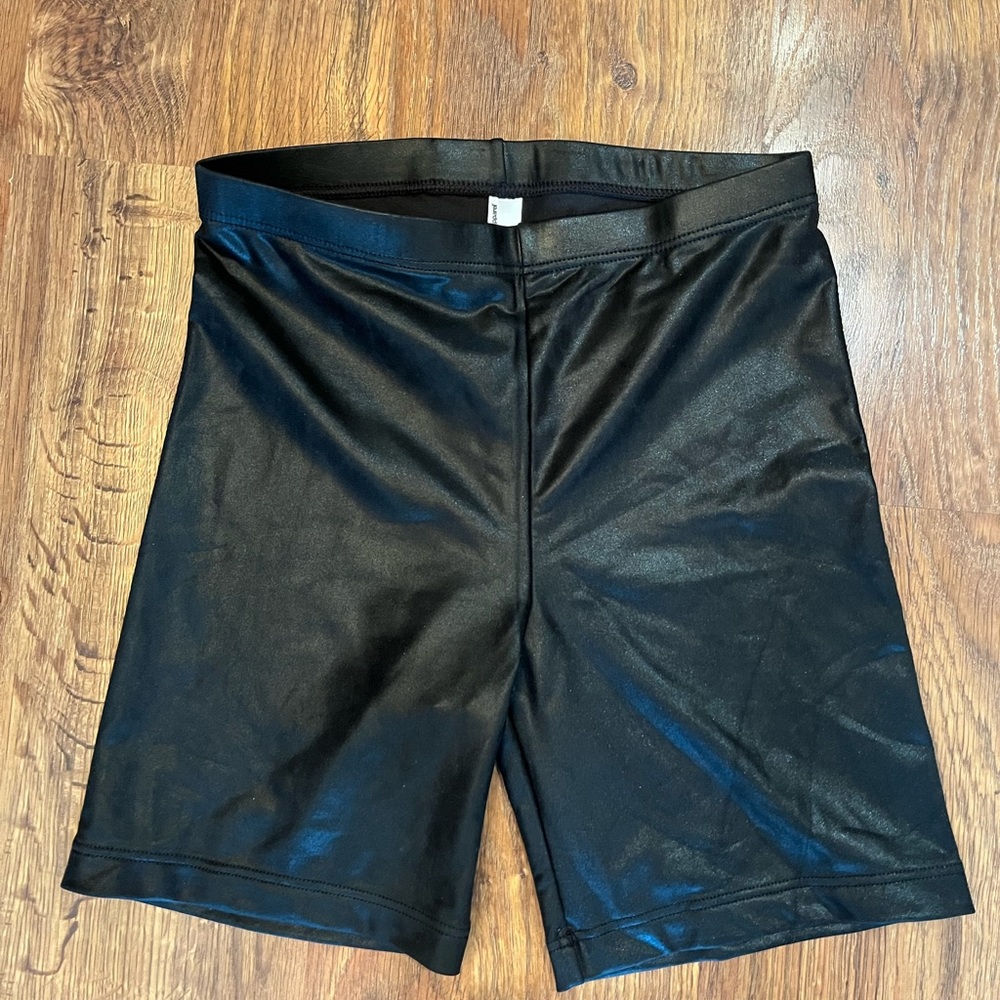 Shiny black bicycle / bike shorts